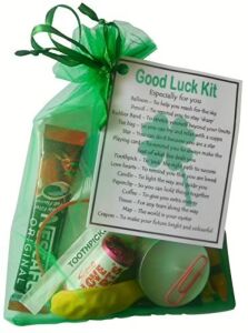 Good luck kit gift in green organza bag with laminated label explaining the meaning of each item inside
