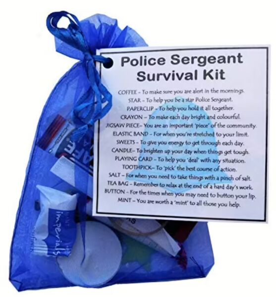 Hand-made police sergeant survival kit in organza bag with laminated label explaining each symbolic item inside