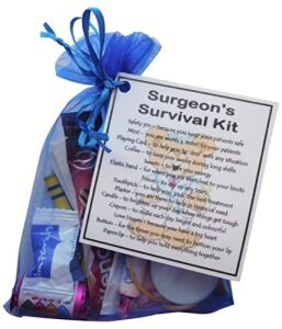 Surgeon's Survival Kit in organza bag with laminated label explaining the significance of each item